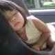 Child sleeping in a carseat.