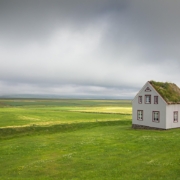 A secluded house in a field.
