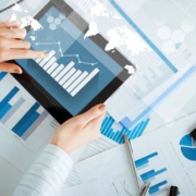 Individual looking at data graphs.