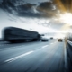 Vehicles driving on a road.