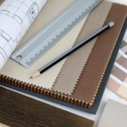 Architectural drawings on a desk.